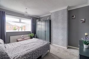 Bedroom One- click for photo gallery